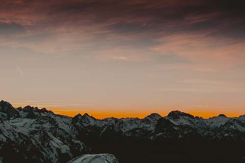 mountain range icy mountain sunset scenery nature